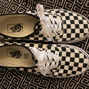 Black/cream checker Vans, woman size 10.5. Gently worn.